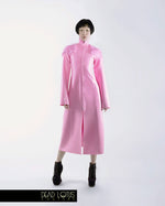 ARMUM long latex trench coat with faux fur; bubblegum pink latex with long front zipper by Dead Lotus Couture on female model