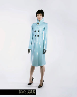 PLUVIA Classic Trench Coat in Turquoise Latex with large buttons, high collar, gloves by Dead Lotus Couture on female model